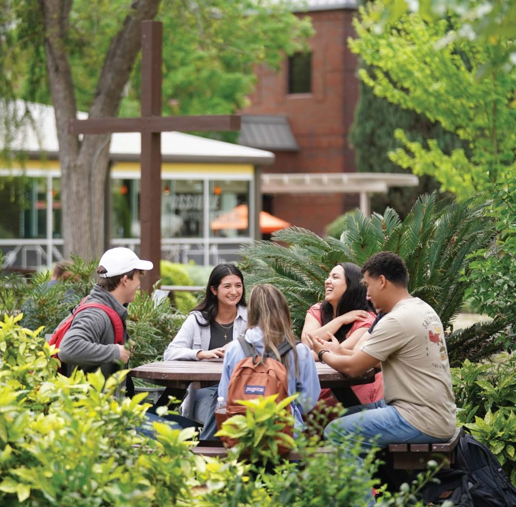 FPU students at a table outside