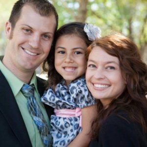 Whitney and Daniel Bunker with their daughter